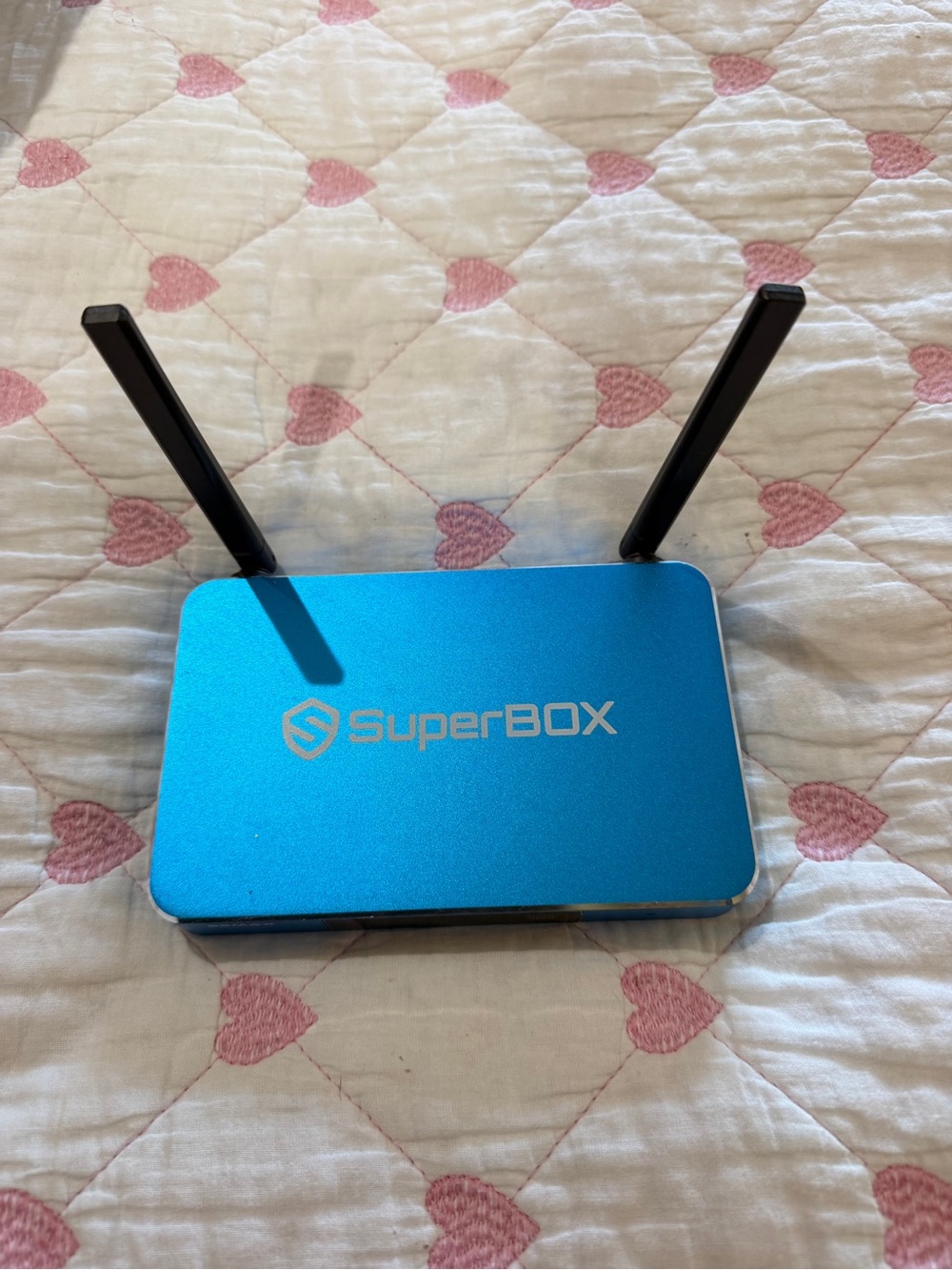 TP-Link blue dual-antenna SuperBOX wireless router